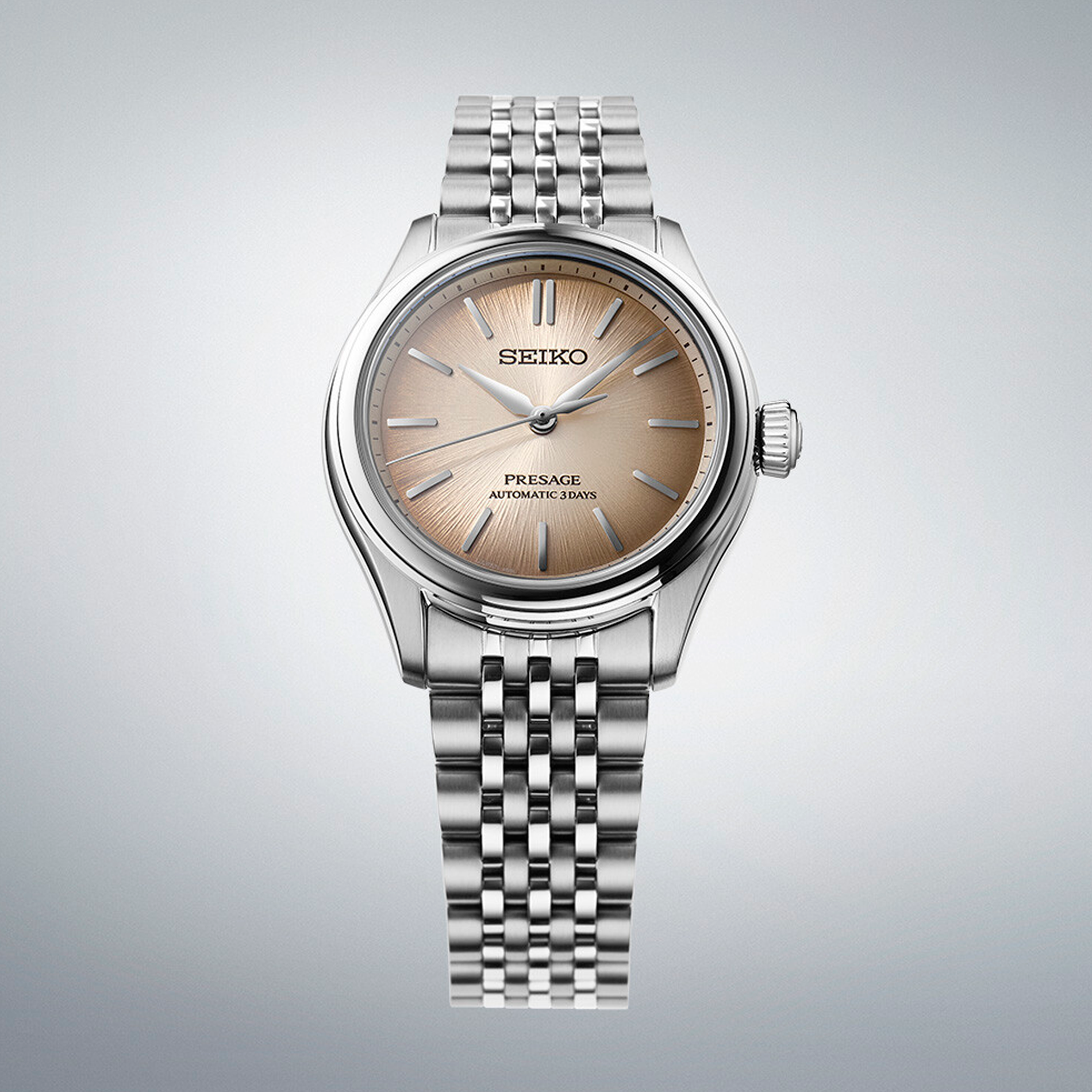 Seiko Presage SPB523J1 med champagnefarvet urskive og stållænke