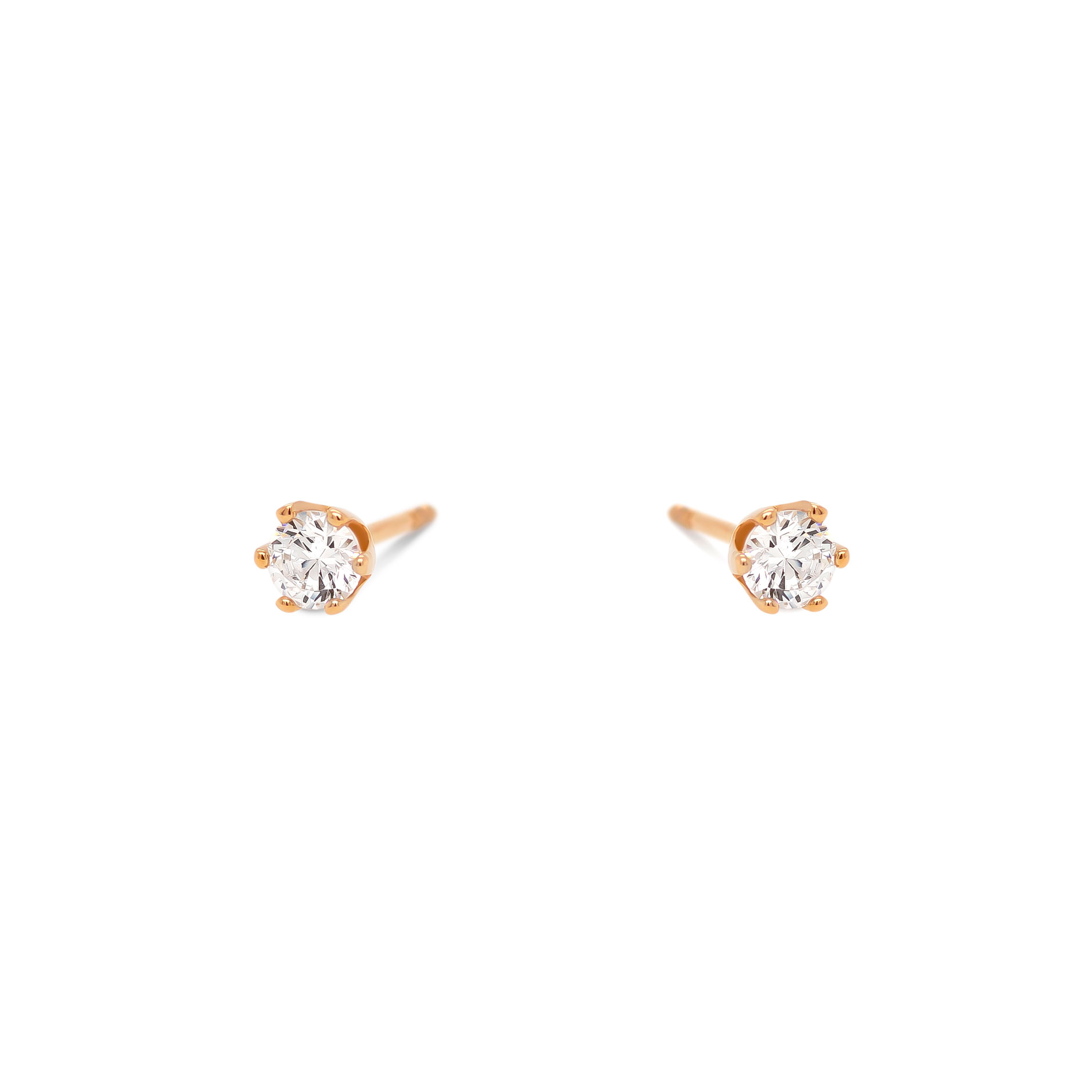 Shelly Solitaire ørestikker i 8 kt. guld med klare zirkonia i klassisk solitaire-design med seks grabber