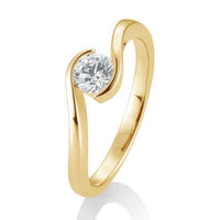 Solitaire diamantring med twist desing i guld