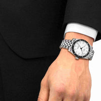 Tissot PR516 38 mm automatisk herreur med hvid urskive på håndled